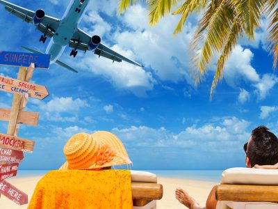 Couple,On,The,Tropical,Beach,Travel,Concept